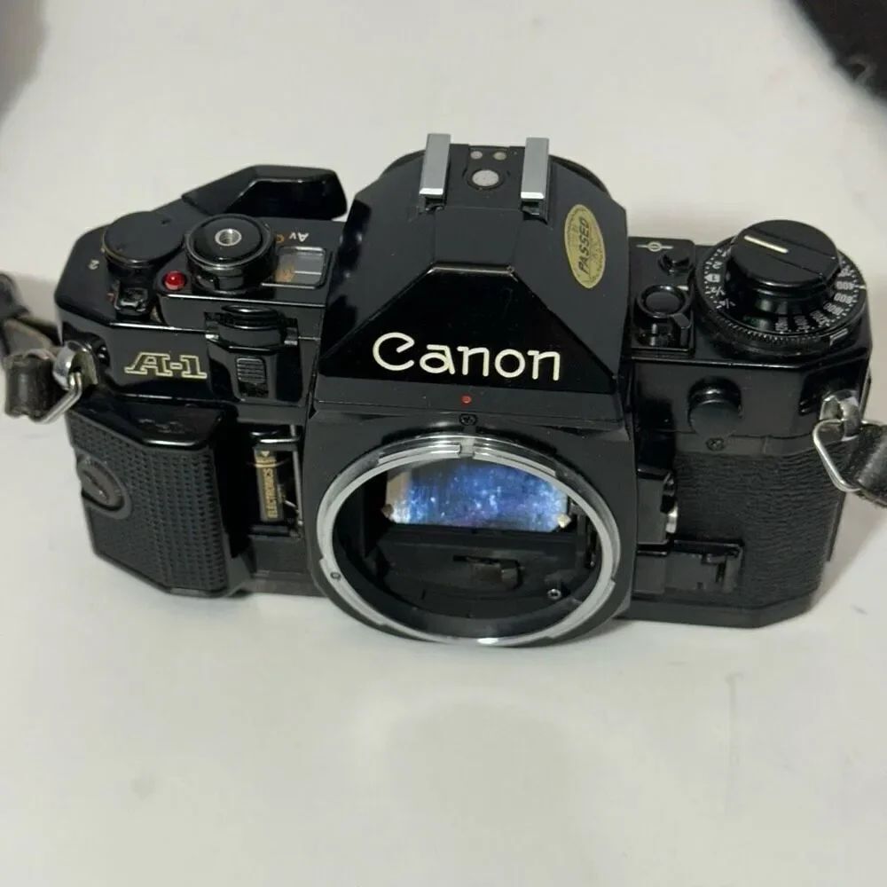 Vintage Canon A-1 Black 35 mm SLR with Strap/ Body Only